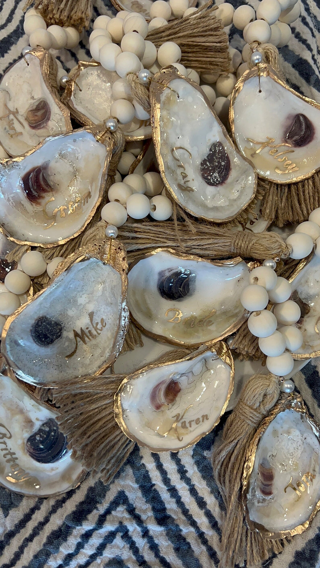 Coastal wedding favors. Gilded napkin ring. Oyster napkin ring. Oyster shell wedding favor.