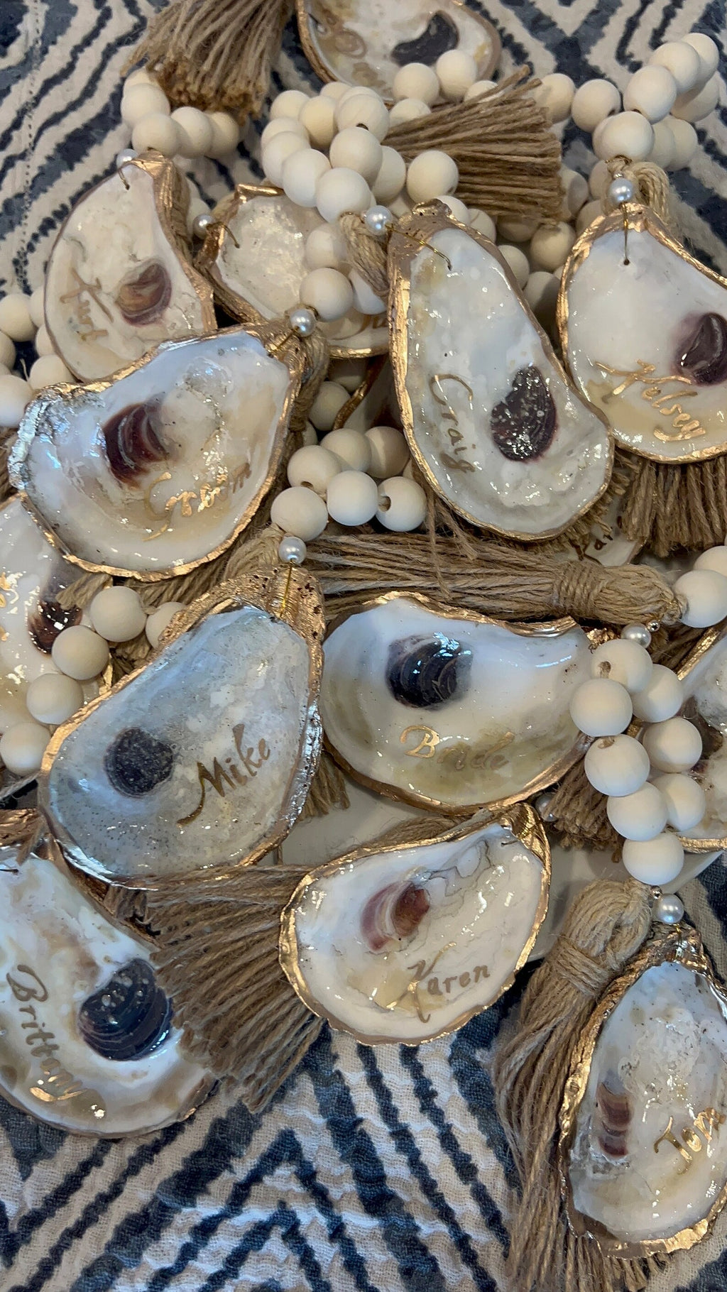 Coastal wedding favors. Gilded napkin ring. Oyster napkin ring. Oyster shell wedding favor.