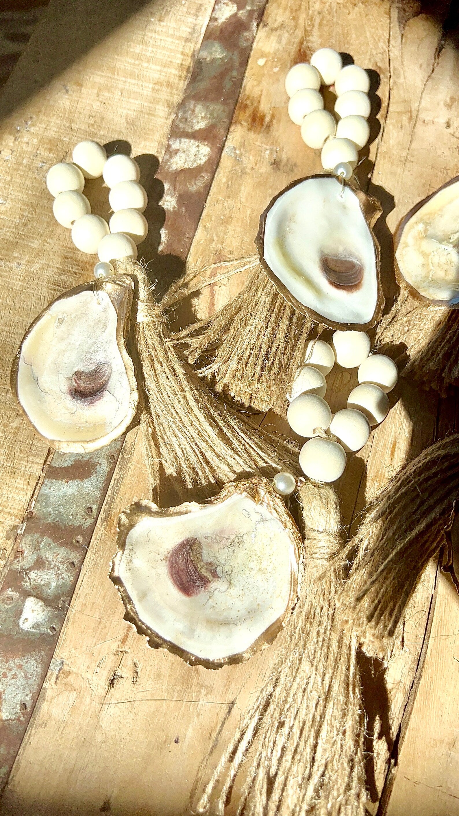Coastal wedding favors. Gilded napkin ring. Oyster napkin ring. Oyster shell wedding favor.