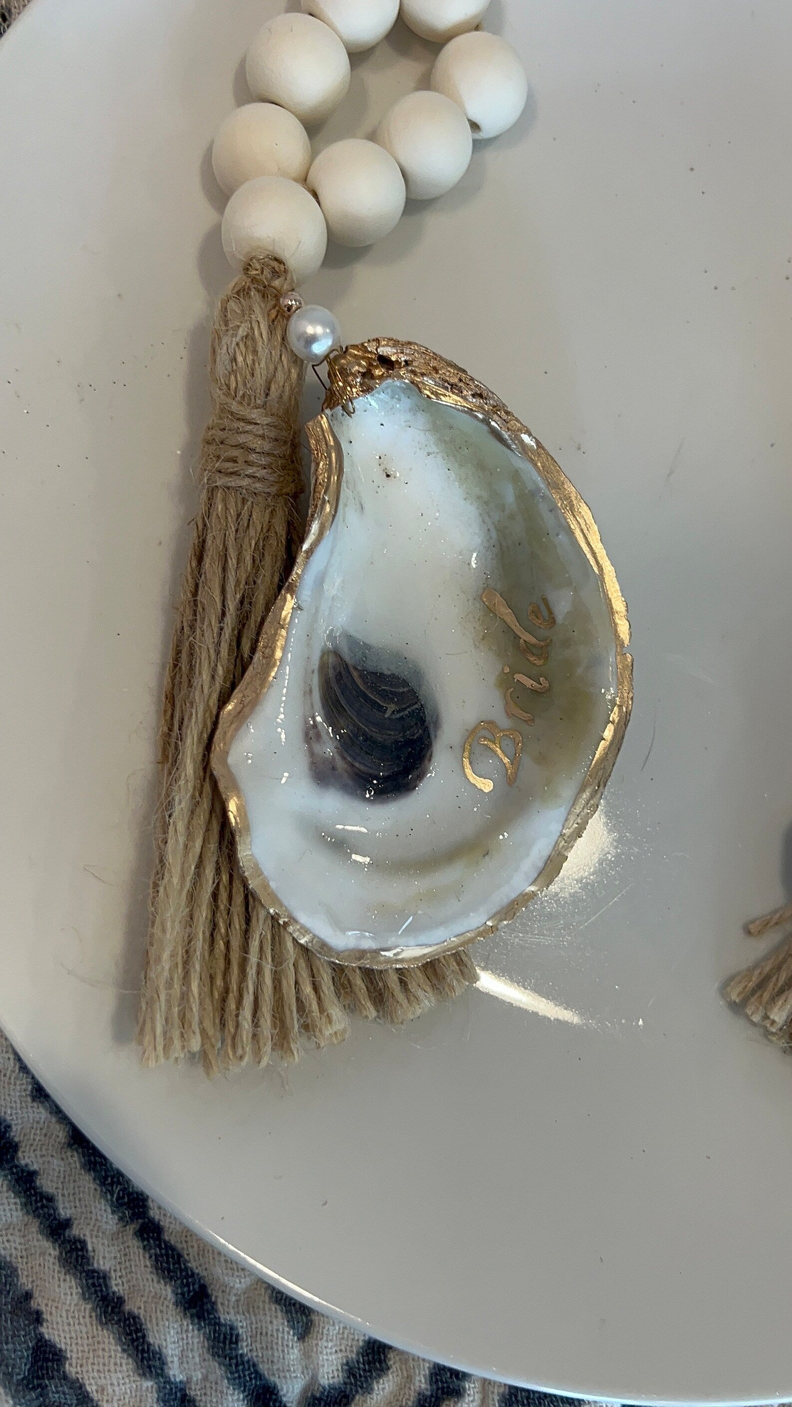 Serena/Lily style oyster shell napkin ring destination wedding favor