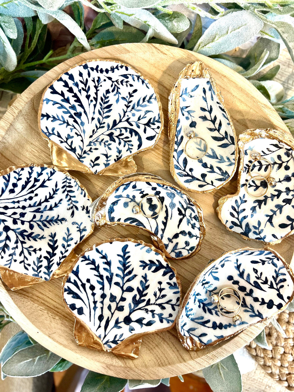 Blue and white coastal floral design, scallop shell and oyster shell, ring dishes, and party favors for bridal showers, baby showers, bachelorette parties, and weddings