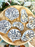 Blue and white coastal floral design, scallop shell and oyster shell, ring dishes, and party favors for bridal showers, baby showers, bachelorette parties, and weddings